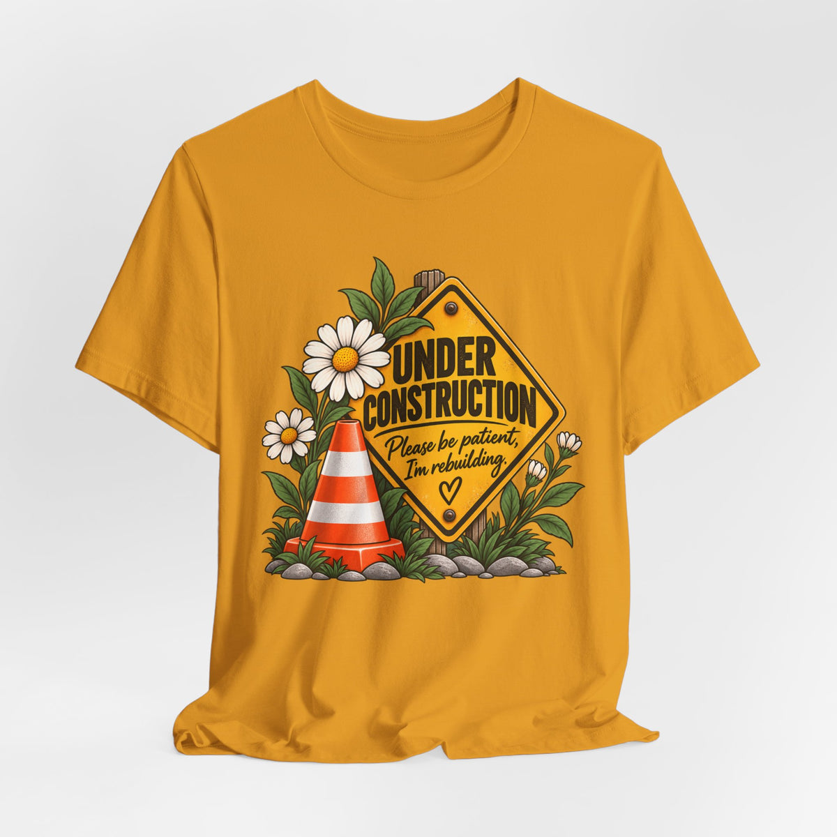 Under Construction — Women’s Tee | Still Becoming — Roots Recovery Housing