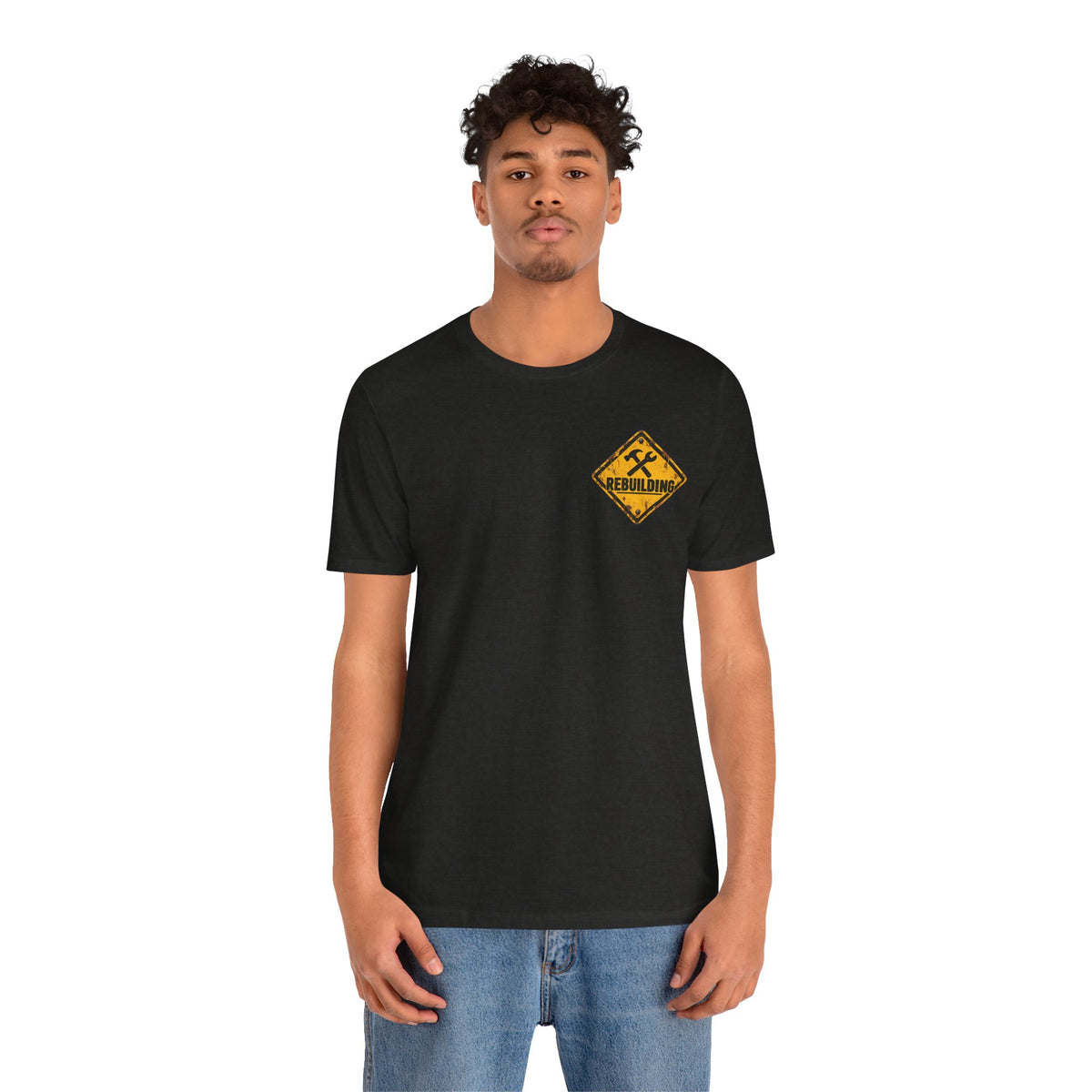 Under Construction — Unisex Tee | I’m Rebuilding — Roots Recovery Housing