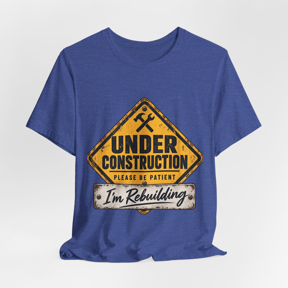 Under Construction — Unisex Tee | I’m Rebuilding — Roots Recovery Housing