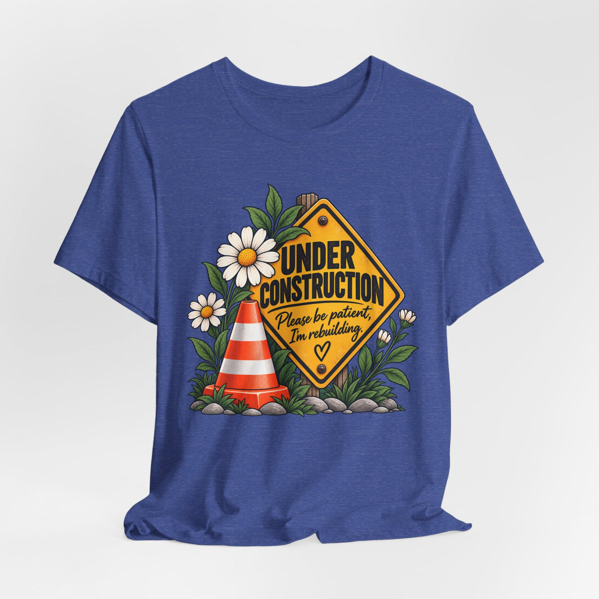 Under Construction — Women’s Tee | Still Becoming — Roots Recovery Housing