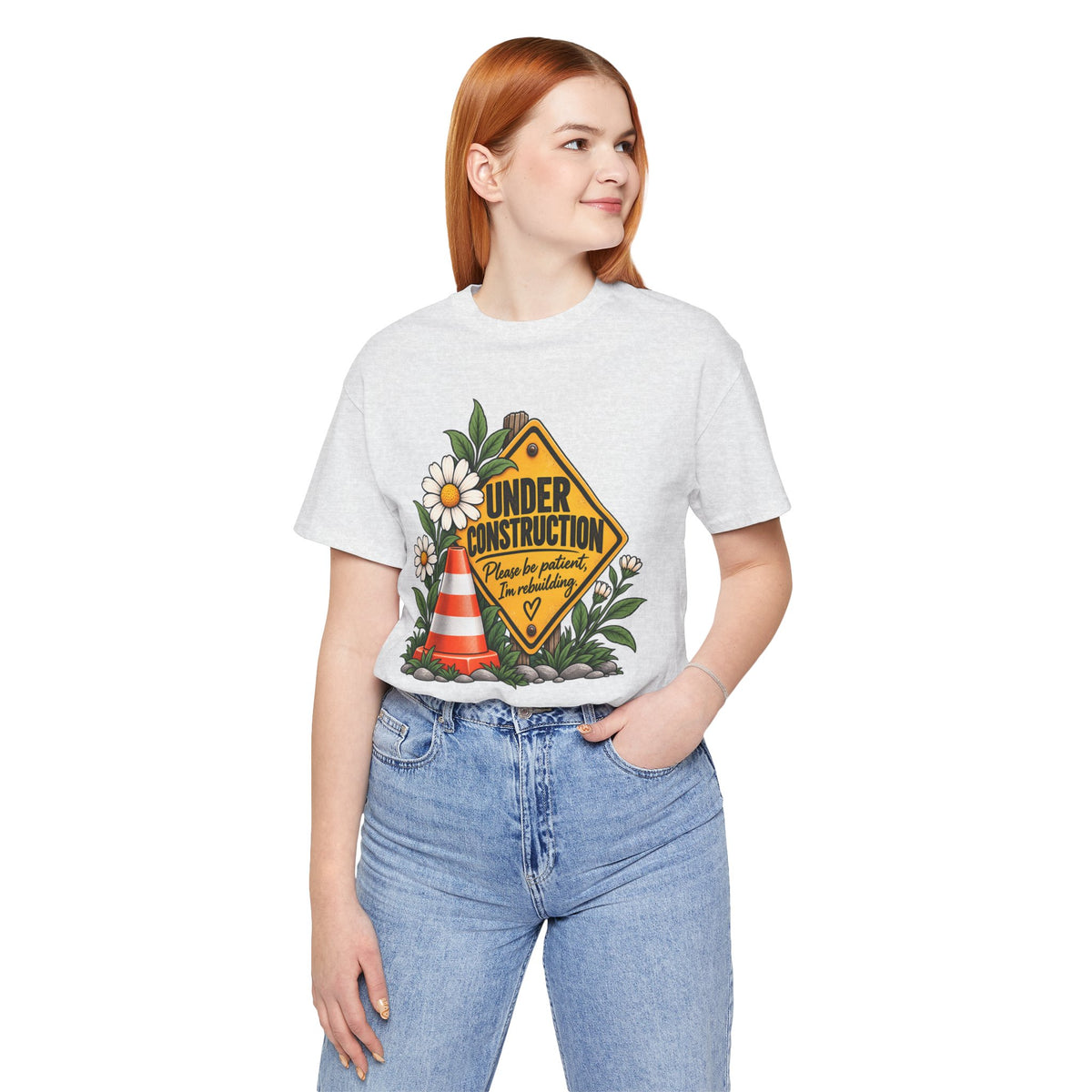 Under Construction — Women’s Tee | Still Becoming — Roots Recovery Housing