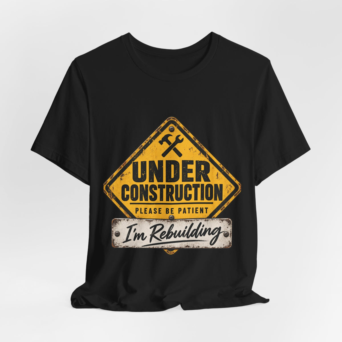 Under Construction — Unisex Tee | I’m Rebuilding — Roots Recovery Housing