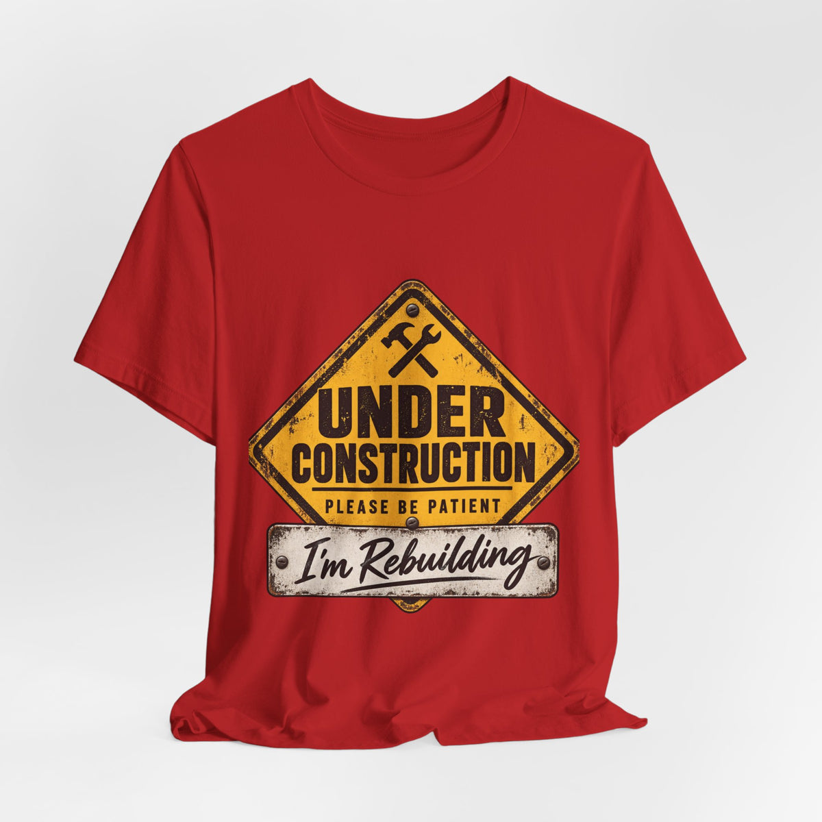 Under Construction — Unisex Tee | I’m Rebuilding — Roots Recovery Housing